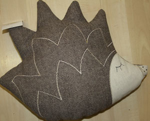 Tweed hedgehog cushion.